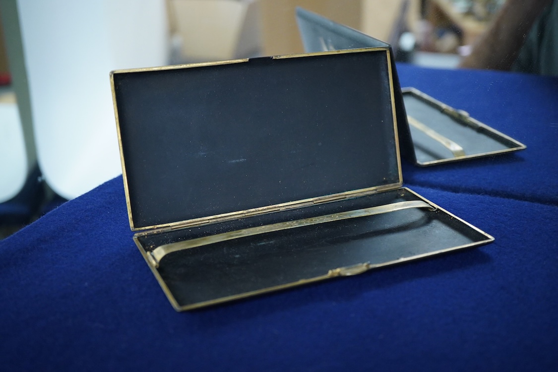 A Japanese photograph album, late 1940's to include banknotes and a telegram, together with a cigarette case